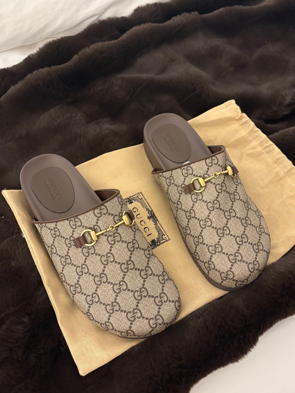 Gucci Sol logo clogs